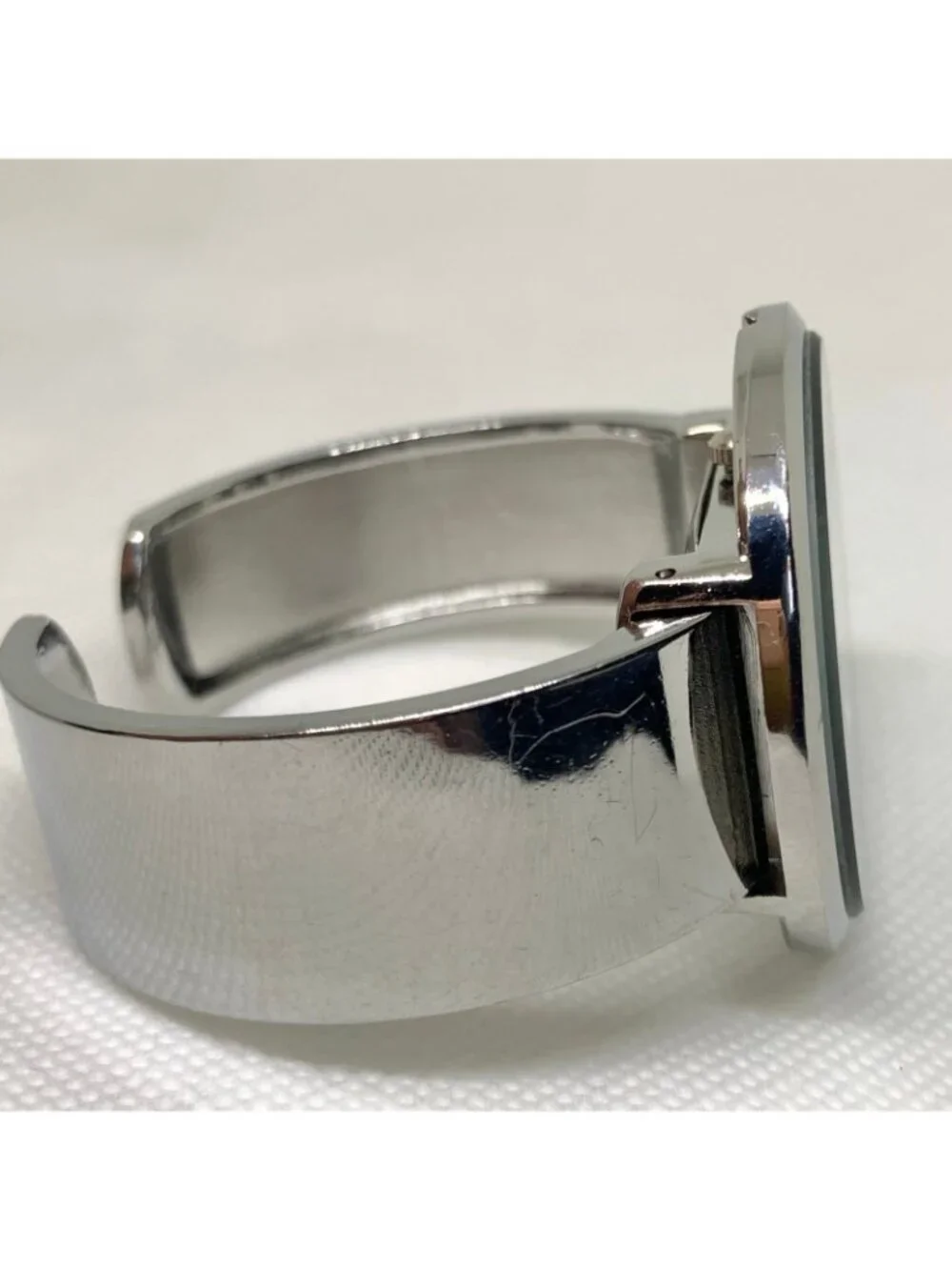 Cansnow silver black tone cuff bracelet women’s watch 42mm  quartz 6.5” running